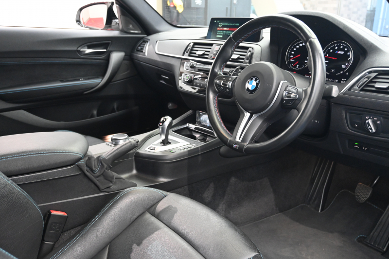 BMW Mシリーズ M2 ｺﾝﾍﾟﾃｨｼｮﾝ　正規D車 後期LCI ｺﾝﾌｫｰﾄA ｲﾝﾃﾘｼﾞｪﾝﾄS 黒革 純正iDriveﾅﾋﾞ harman/kardon 19ｲﾝﾁAW Mﾊﾟﾌｫｰﾏﾝｽﾊﾟｰﾂ KW車高調　2年保証付